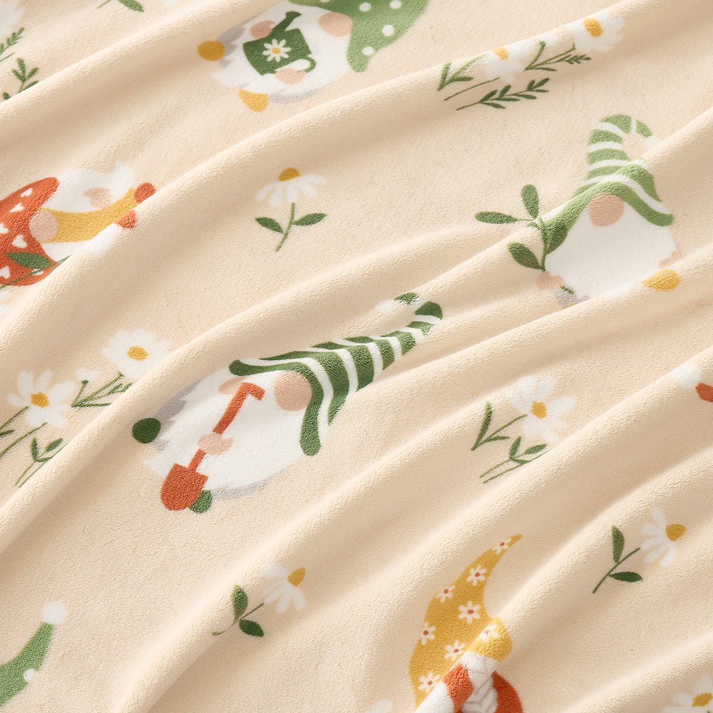 Close up of spring gnomes milkyplush throw blanket in Beige, showcasing colorful gnome pattern and smooth plush texture #color_Beige