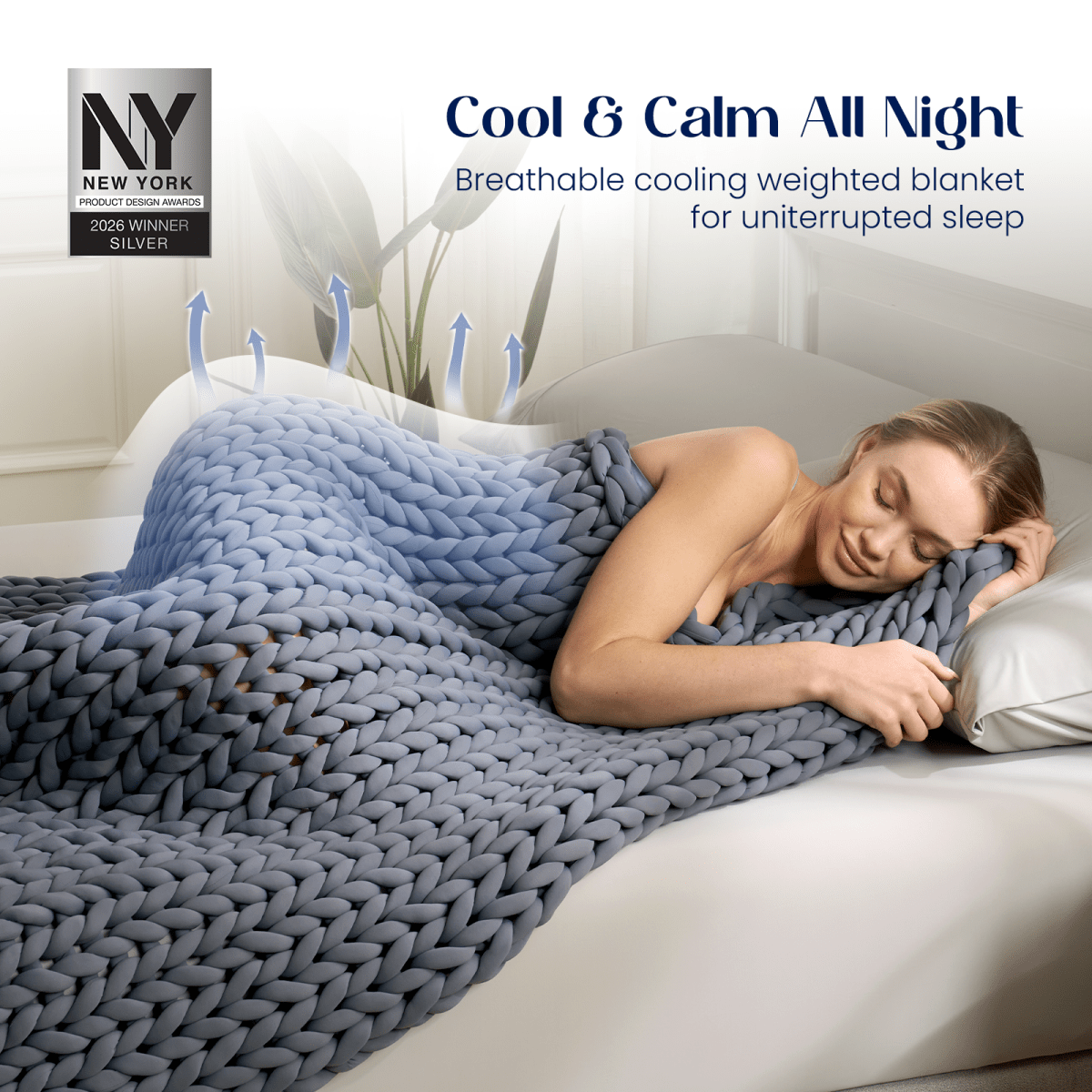 Adult sleeping under Cozy Bliss Performance Cooling Weighted Blanket on a bed, illustrating cooling and breathable sleep use. #color_Charcoal Grey