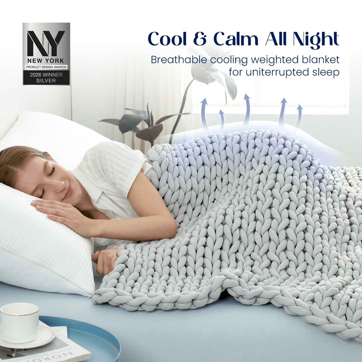 Adult sleeping under Cozy Bliss Performance Cooling Weighted Blanket on a bed, illustrating cooling and breathable sleep use. #color_Light Grey