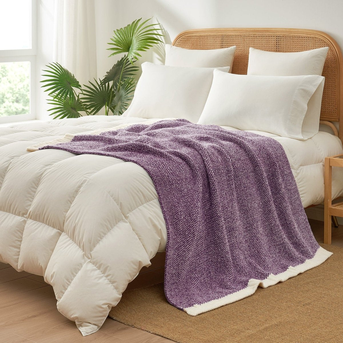 Heather Feather Yarn Throw Blanket in Lilac styled on a bed, enhancing bedroom decor with a soft, elegant and cozy layered look.  #Color_Lilac