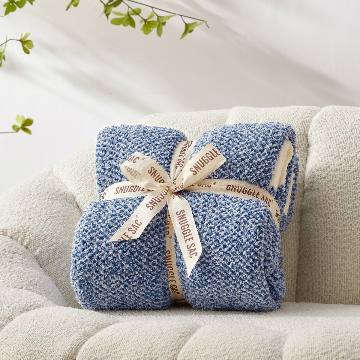 Heather Feather Yarn Throw Blanket in dark blue neatly folded with ribbon, a perfect gift idea for holidays, housewarming or special occasions. #Color_Dark Blue