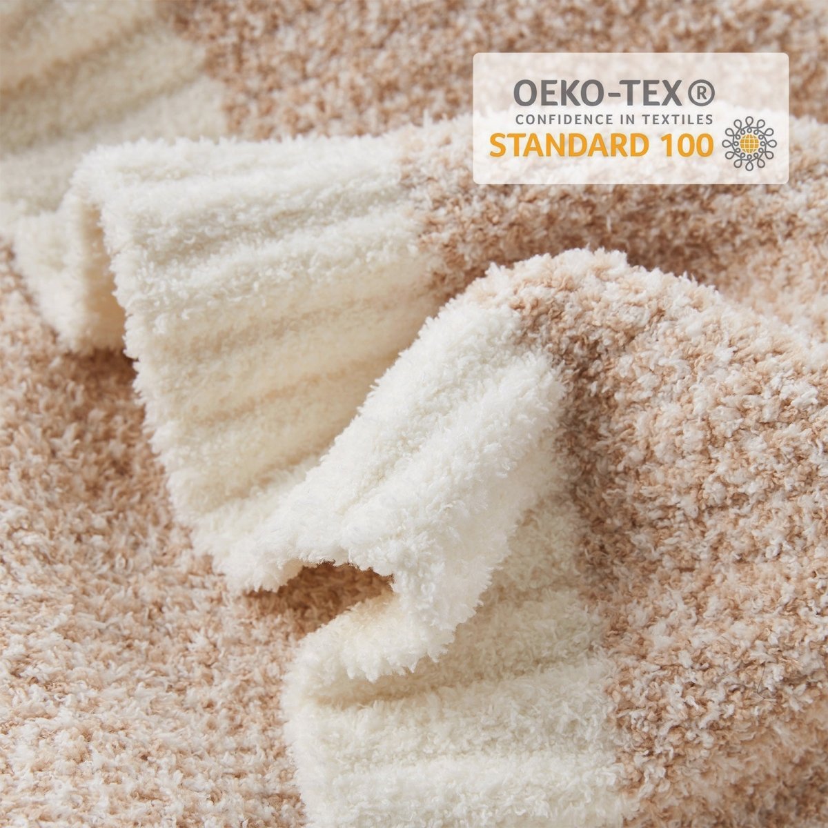 Close-up of Heather Feather Yarn Throw Blanket in beige showcasing plush feather yarn texture and OEKO-TEX STANDARD 100 certification.  #Color_Beige