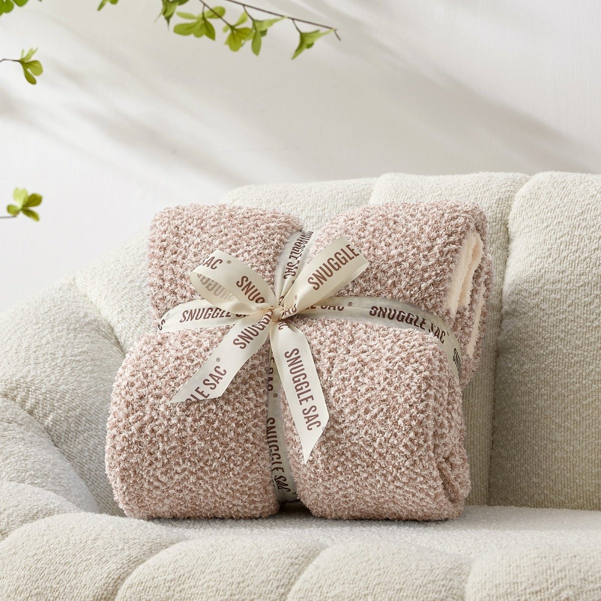 Heather Feather Yarn Throw Blanket in brown neatly folded with ribbon, a perfect gift idea for holidays, housewarming or special occasions. #Color_Light Brown