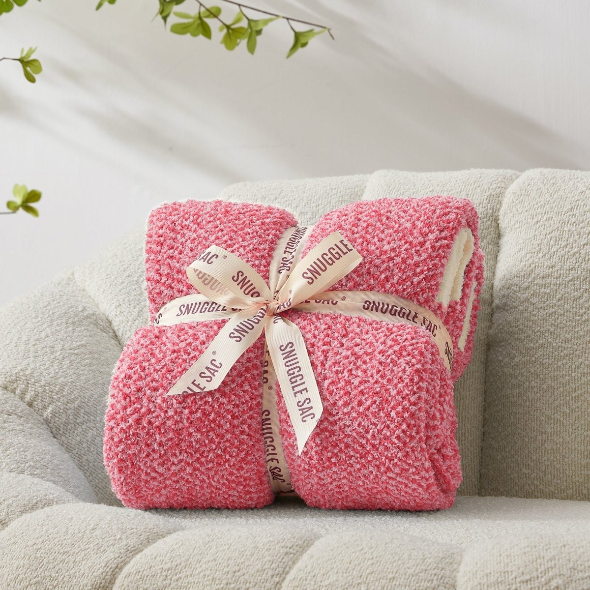 Heather Feather Yarn Throw Blanket in hot pink neatly folded with ribbon, a perfect gift idea for holidays, housewarming or special occasions. #Color_Hot Pink