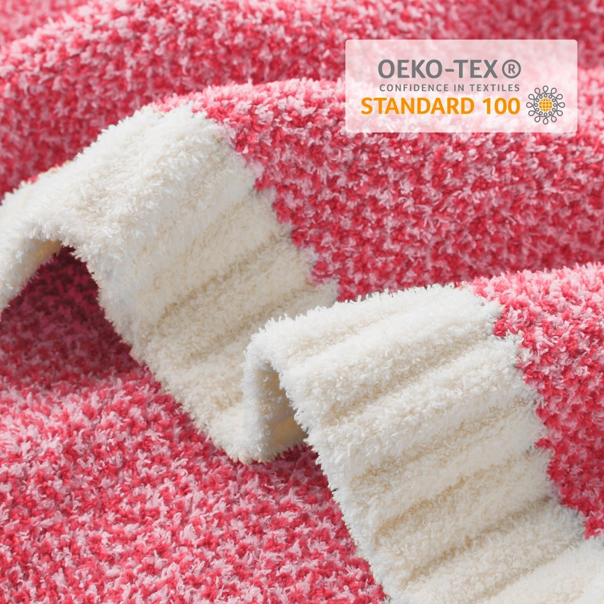 Close-up of Heather Feather Yarn Throw Blanket in Hot Pink showcasing plush texture and OEKO-TEX STANDARD 100 certification. #color_Hot Pink